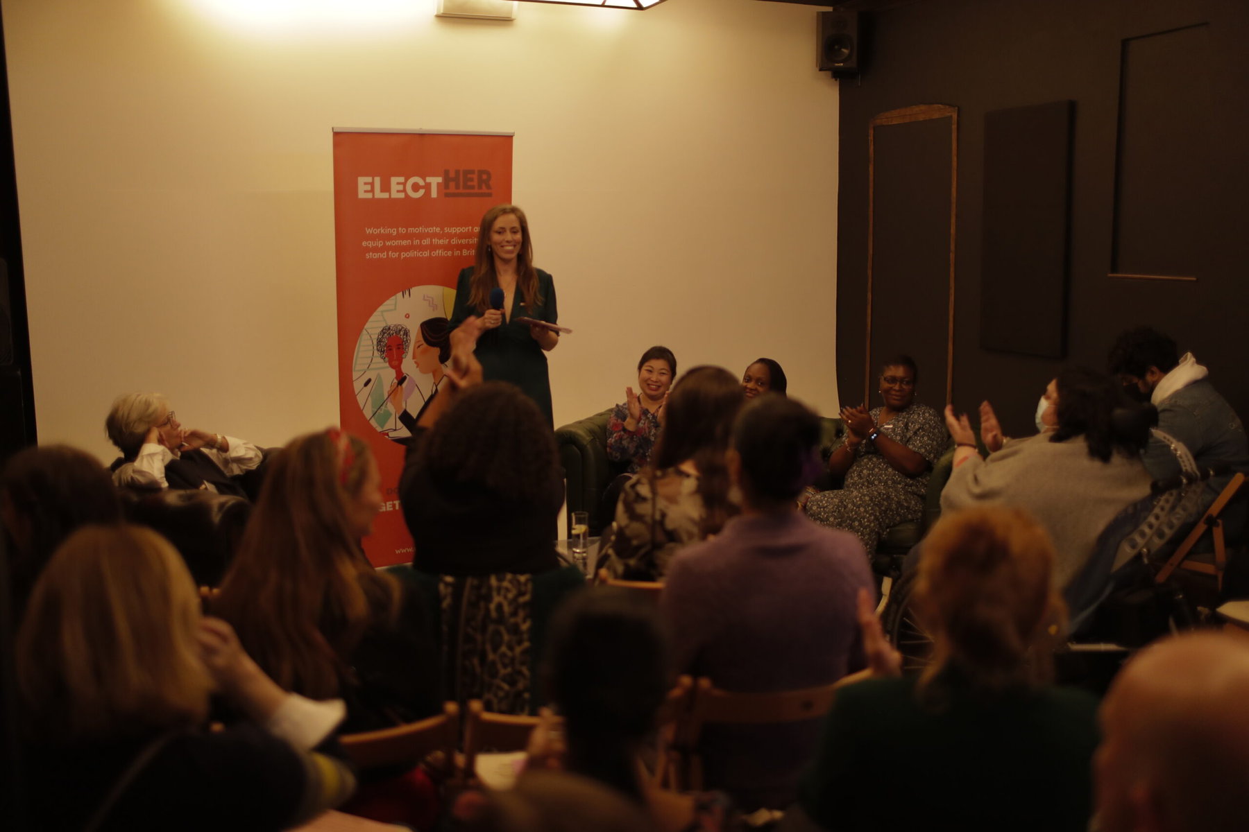 Hannah Stevens speaks to an audience.